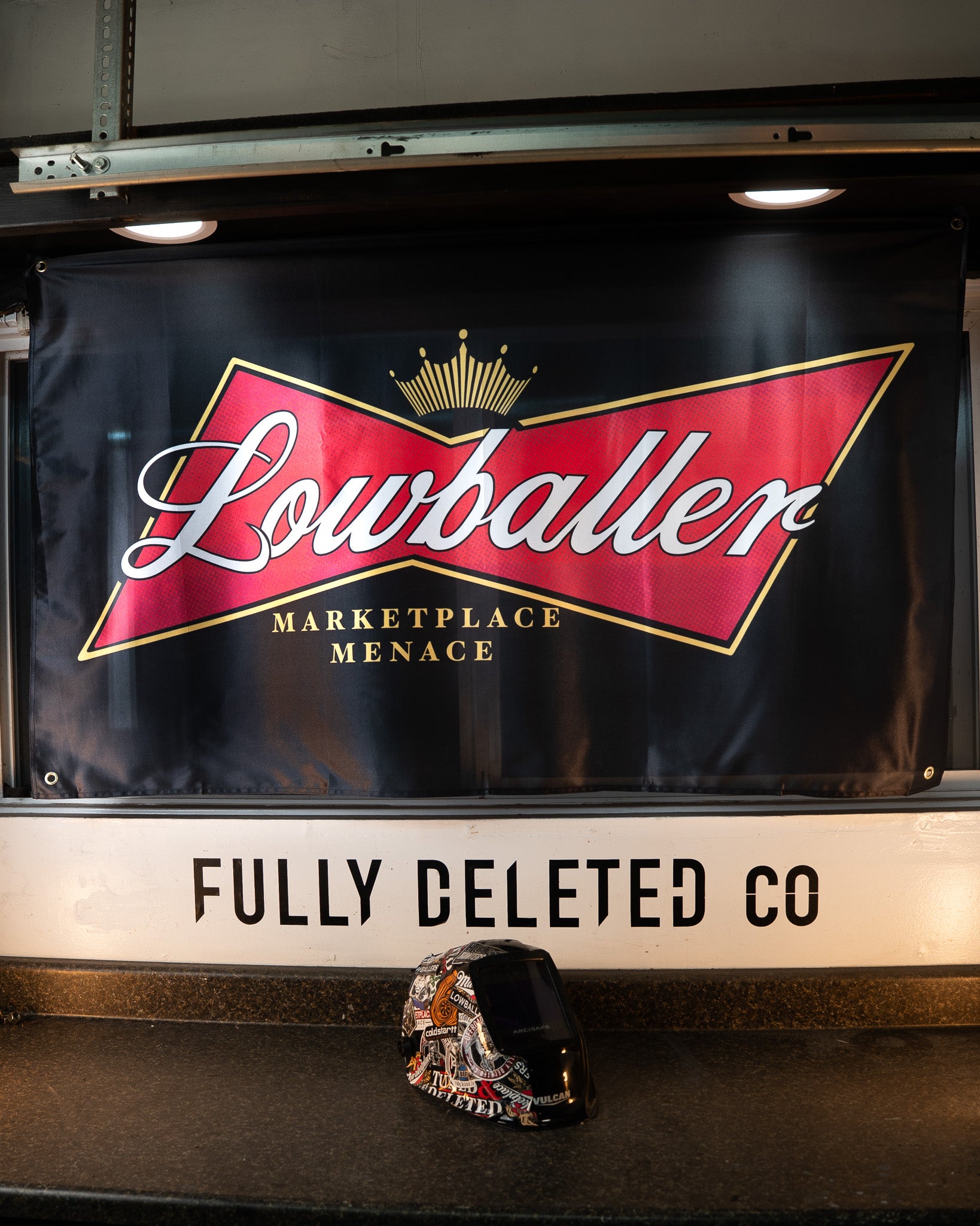 Lowballer Marketplace Menace banner on a vehicle with 'Fully Deleted Co' text below.